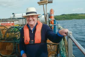 Rick Stein in lifejacket on fishing boat