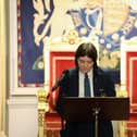 Erin Whoriskey at Hillsborough performing her poem on the Good Friday Agreement