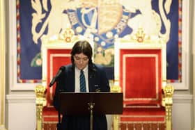 Erin Whoriskey at Hillsborough performing her poem on the Good Friday Agreement