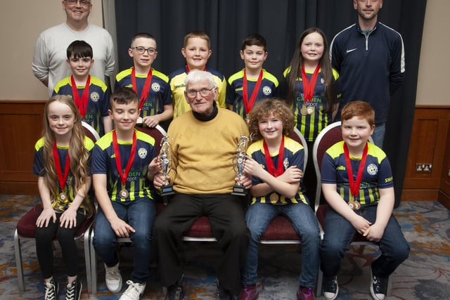 John ‘Jobby’ Crossan presenting the U9 Championship Summer and Winter Cups to Sion Swifts FC at the Annual Awards in the City Hotel on Friday night last. Included are coaches Chris Brown and Glenn Crompton.