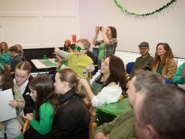 Some of the families in attendance at the Mellow DEEDS Concert on St. Patrick's Day in the Old Library Trust, Creggan.