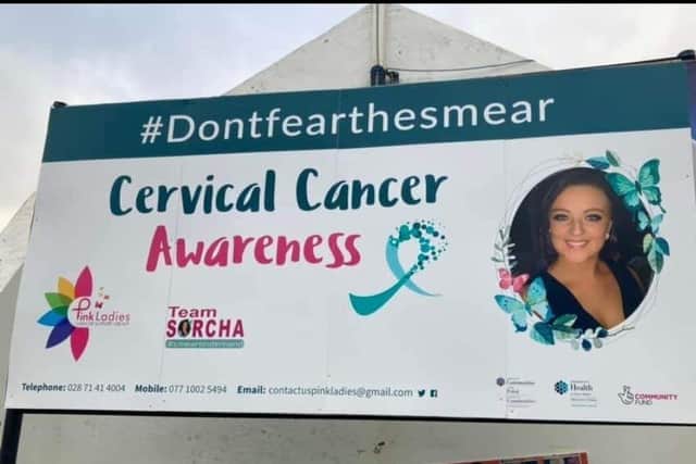 The Pink Ladies Cancer Support Group and Team Sorcha Cervical Cancer Awareness banner, which has been located at Free Derry Corner in January.