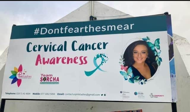 The Pink Ladies Cancer Support Group and Team Sorcha Cervical Cancer Awareness banner, which has been located at Free Derry Corner in January.