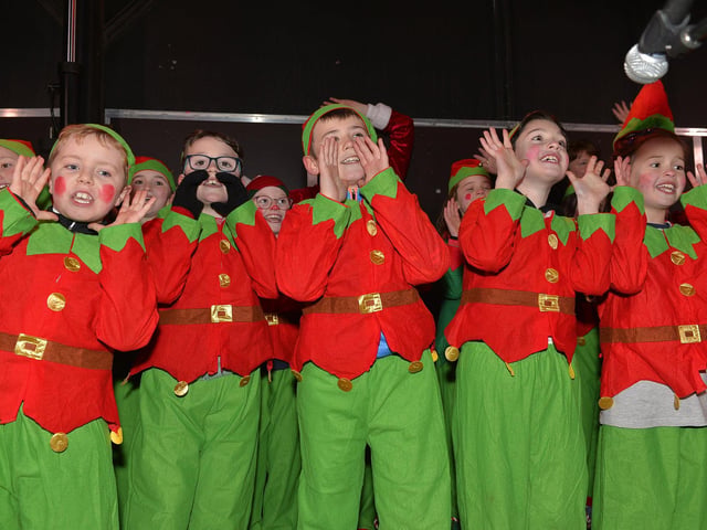 Pupils from Hollybush Primary School sing Christmas carols at the Culmore Community Hub on Friday night. Photo: George Sweeney