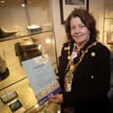 The Mayor, Patricia Logue proudly shows off her certificate after completing the DEEDS Dementia Immersive Experience Tier 1 Programme at the Guildhall on Monday afternoon. (Photos: Jim McCafferty Photography)