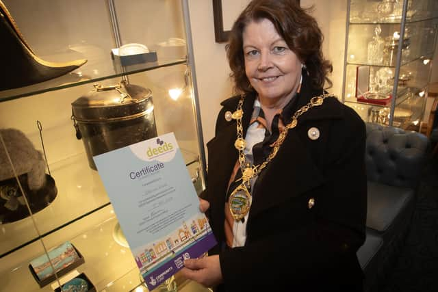 The Mayor, Patricia Logue proudly shows off her certificate after completing the DEEDS Dementia Immersive Experience Tier 1 Programme at the Guildhall on Monday afternoon. (Photos: Jim McCafferty Photography)