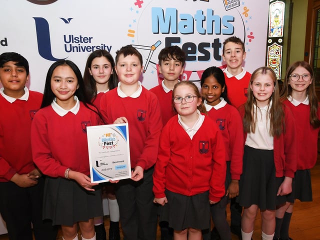 Lisnagelvin Primary School pupils pictured with their certificate at the Foyle Kumon NI Maths Fest in the Guildhall. : .