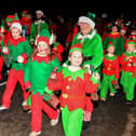 Culmore Community Partnership Elf Parade prior to the Christmas Lights switch on at the Community Hub on Friday night. Photo: George Sweeney