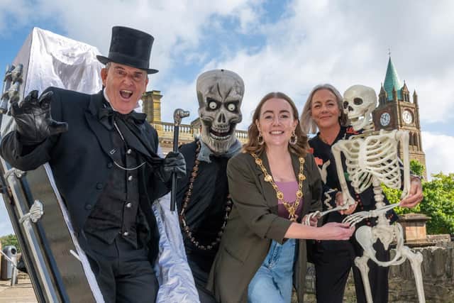 Martin 'the Undertaker' Mullan with Mayor Grace Uí Niallais and Halloween Festival coordinator Andrea Campbell marking the release of ‘The Number One Halloween Song - What's the Craic?’