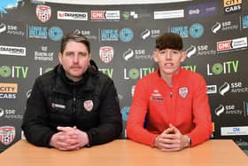 Derry City boss Ruaidhrí Higgins pictured alongside teenager Luke O'Donnell after the Buncrana lad signed his first professional terms. Photograph by Kevin Morrison