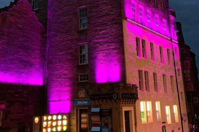 The Magee campus will join Camera Obscura - Edinburgh (pictured) to shine brightly in the charity’s colours, pink, purple and teal, as part of the national campaign designed to “Shine a Light” on Secondary Breast Cancer Day.