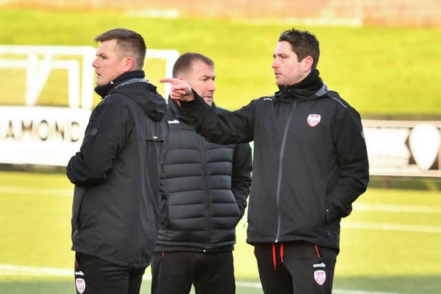 Derry City manager Ruaidhrí Higgins talks with his new first-team coach Conor Loughrey and assistant Alan Reynolds, during pre-season last year.