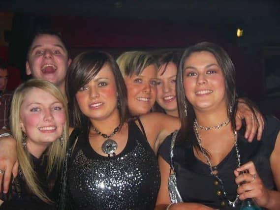 Revellers on a night out in Cafe Roc and Earth in December, 2005.