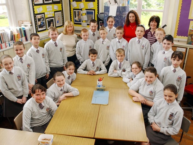 P 7 pupils at St. Eugene's Primary School. Included are Mrs. Rhonda Hutchman, classroom assistant, Miss Tracey Foley, student teacher, and Mrs. Sheena Wake, teacher. (2305C29)