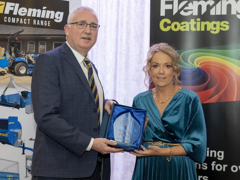 Cherith Thompson of Bond's Glen receives the 'Club Person of the Year' Award from Brian Dougherty at the NW Cricket awards evening.