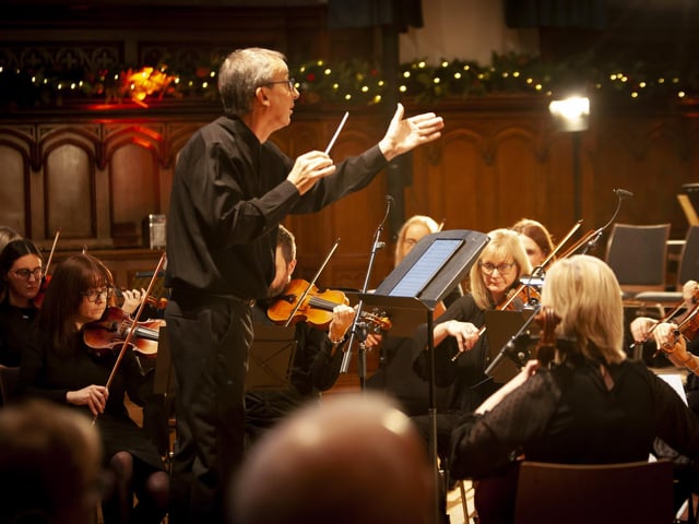 Conductor Brian McKay pictured during Sunday’s event at the Guildhall.