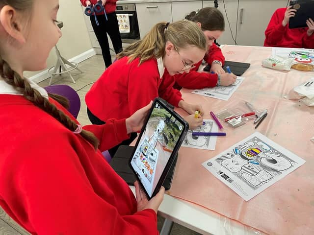 Children get to create their own augmented reality imagery as part of Engineering Week in February 2024.