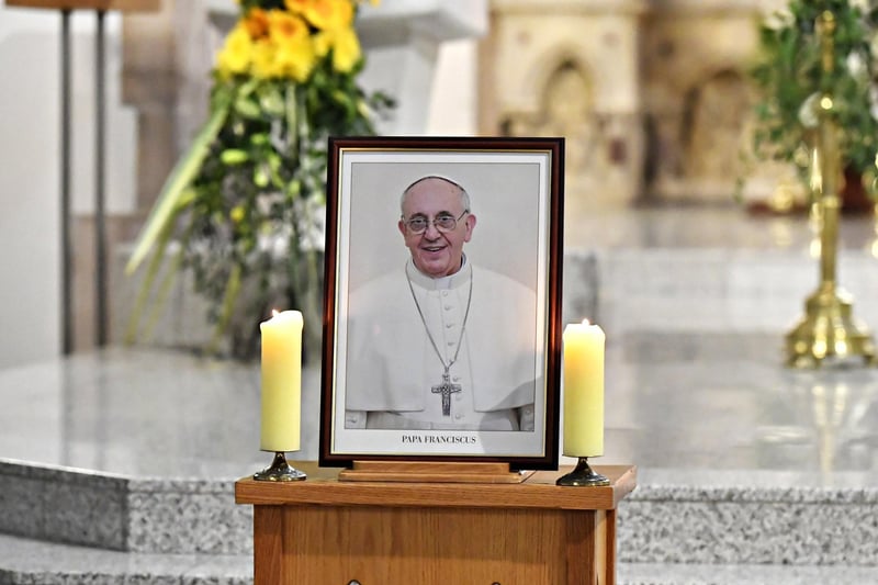 A photograph on display in St Eugene’s Cathedral of Pope Frances who died early on Monday morning aged 88. Photo: George Sweeney