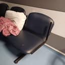 The corridor seating where the woman said they were told her 80-year-old father could sleep.