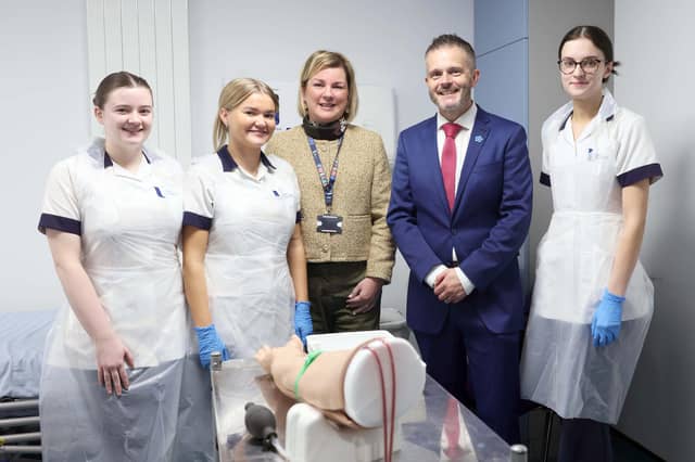 Health Minister Robbie Butler with nursing students at Magee College during a visit to the city on Wednesday last.
