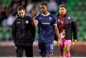 Derry City manager Tiernan Lynch and Sadou Diallo begin the post-mortem after defeat to Shamrock Rovers in Tallaght. Photo by Stephen McCarthy/Sportsfile