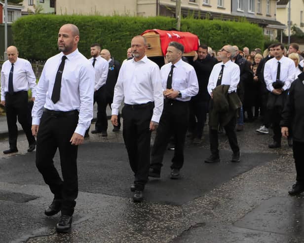 The funeral cortege of Derry republican Thomas McCourt draped by the Starry Plough flag, making its way from his home in Osborne Street, on Monday. (Photo - Tom Heaney, nwpresspics)