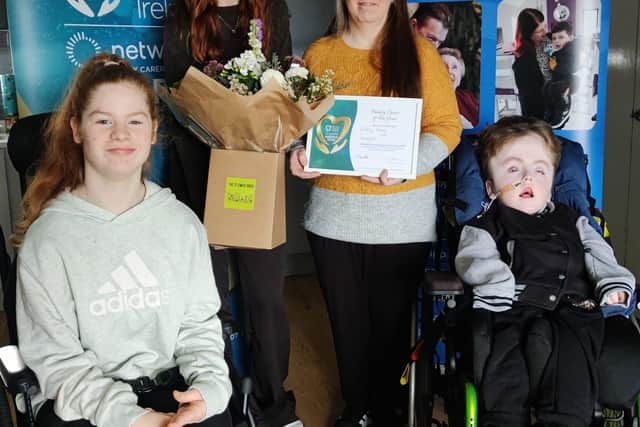 Pictured left to right are Lucy Kelly; Patricia Blee, Community Support Manager, Family Carers Ireland; Cathy Kelly, Netwatch Donegal Family Carer of the Year and Timothy Kelly.