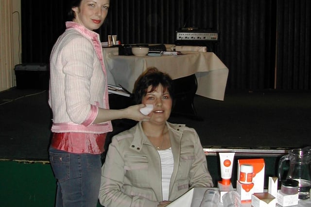 Anne Moore (Virgin Vie consultant) demonstrating make-up products on Terri Moore