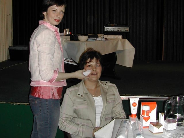 Anne Moore (Virgin Vie consultant) demonstrating make-up products on Terri Moore