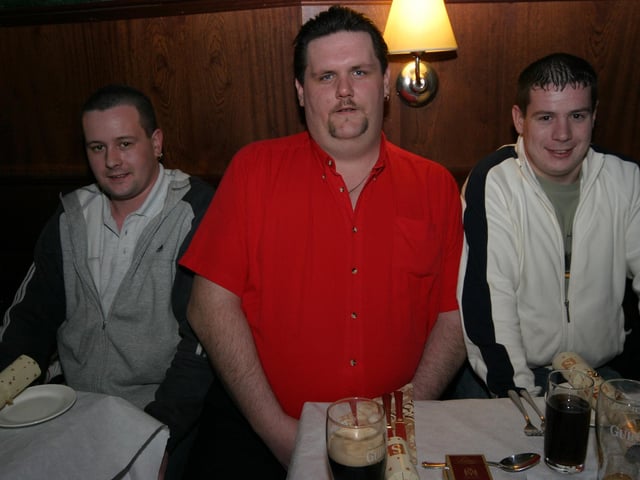 Getting ready to enjoy a Christmas party at Pitchers Wine Bar are members of the Curran faimly.0009/JML. : Parties across Derry in January 2006.