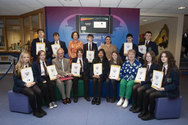 Class 10A, pictured after receiving theri MEE Graduation awards at Oakgrove Integrated College on Tuesday morning last. Included are Mr. John Harkin, Principal, Marie Dunn, Resilio, and at back, Ms. Aislinn Breslin, and Mrs. Judith Colvin, MEE teachers. 