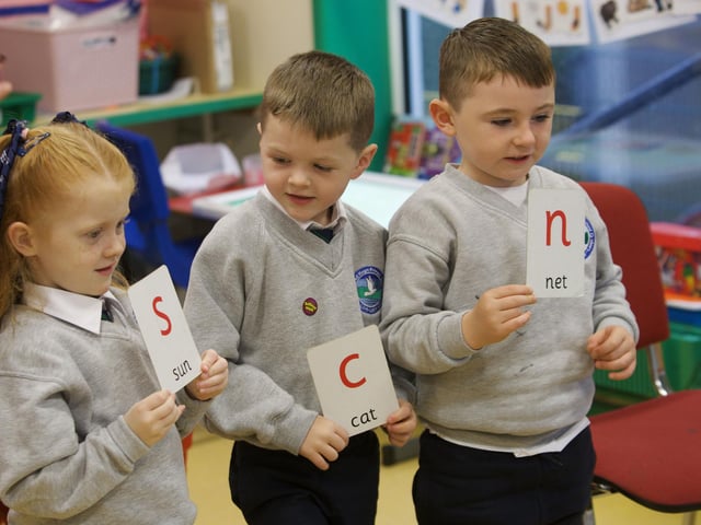 Learning their A, B, Cs at Sacred Heart Primary School.