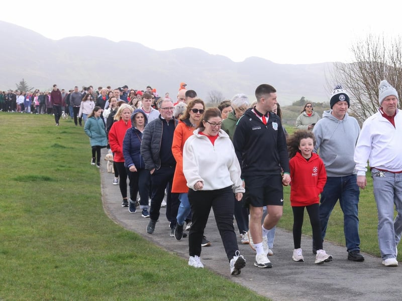 Rioghnach leads the 10th Anniversary Walk in memory of her family.     (Photo - Deirdre Heaney, nwpresspics) : Buncrana Pier Tragedy 10th Anniversary Remembrance Walk. Photos: Deirdre Heaney, nwpresspics.