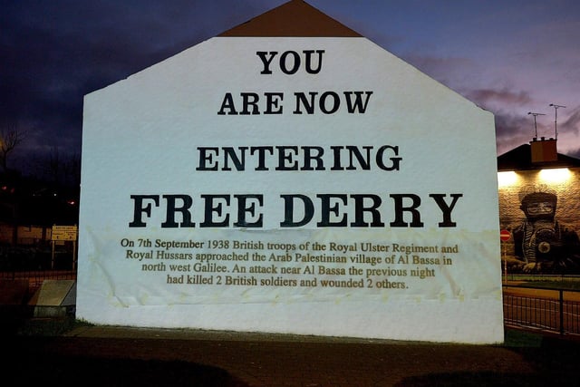 One of the projected images, on Free Derry Corner on Thursday evening, of the British colonial past from the 'The Sun Never Set And The Blood Never Dries' art project created by Art Everywhere.  The event was part of Bloody Sunday 51 anniversary. Photo: George Sweeney. DER2305GS 117