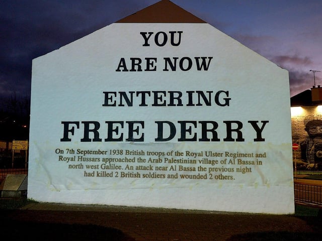 One of the projected images, on Free Derry Corner on Thursday evening, of the British colonial past from the 'The Sun Never Set And The Blood Never Dries' art project created by Art Everywhere. The event was part of Bloody Sunday 51 anniversary. Photo: George Sweeney. DER2305GS 117