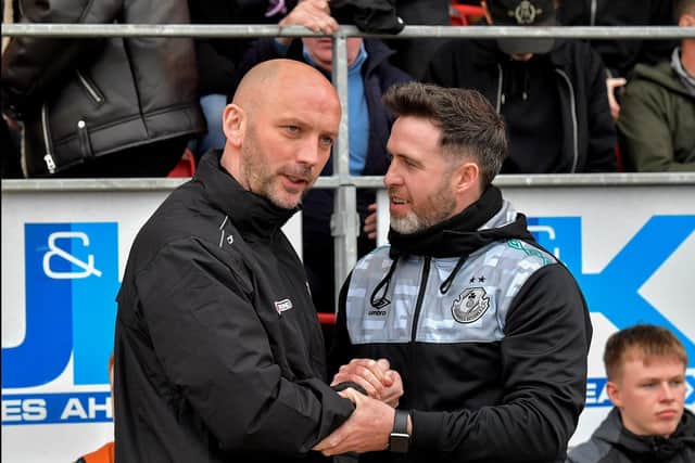 Derry City assistant manager Paddy McLaughlin greets Shamrock Rovers manager Stephen Bradley before the big game kick off, in the Ryan McBride Brandywell Stadium,on Monday evening. Photo: George Sweeney.  DER2318GS – 39