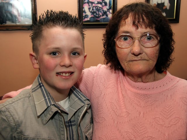 Granny Kennedy joins in the birthday celebrations with Michael 0049JML : Parties and nights out in Derry and Donegal in February 2006.