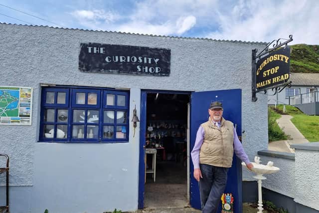 Peter McAvenue, outside the Curosity Shop in Malin Head.