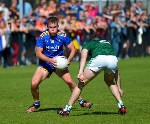 Steelstown’s Eoghan Bradley is challenged by Newbridge’s desmond McColgan at Pairc Brid on Saturday afternoon last. Photo: George Sweeney. DER2236GS –