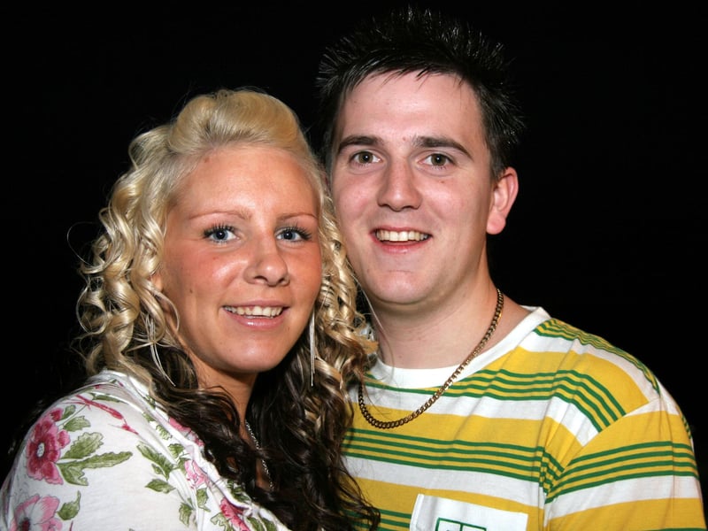 Birthday girl Amanda poses for a photograph with her boyfriend Rory 0625JML