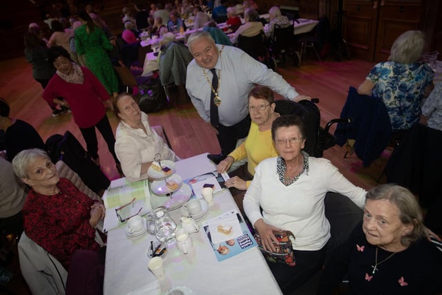Deputy Mayor Darren Guy pictured at the Mayor's Tea Dance on Wednesday with a group from Shantallow.