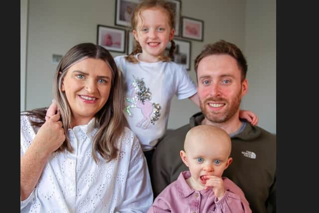 Lauren and Craig Duncan with their daughters Emily and Anna (front).