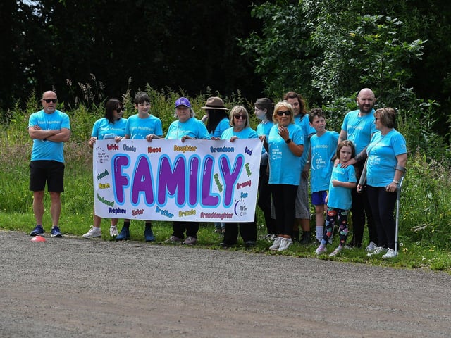 Relay teams gather for the cancer survivors inspiring Lap of Honour around St Columb’s running track prior to 40 fund-raising teams begin the opening laps of the 24 hour relay.  Photo: George Sweeney.