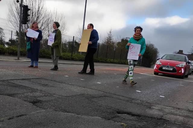 Protest on Northland Road on Monday.