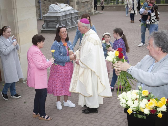 Bishop Dónal McKeown in conversation with some of those who attended Sunday’s Mass at the Sister Clare Crockett Retreat in the Long Tower Church. (Photos: Jim McCafferty Photography)