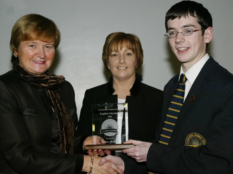 James McDaid who achieved 1st place in NI in English Literature in his recent GCSE exams picturee here receiving an award from Marian Machett, Chief Inspector DENI.  Also in photo is Mrs Catriona O'Donnell.  (1001JB28)