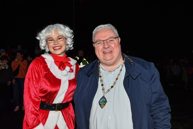 Mrs Santa Claus and Deputy Mayor Darren Guy at the Elf Parade and Christmas Lights switch on at the Community Hub on Friday night. Photo: George Sweeney