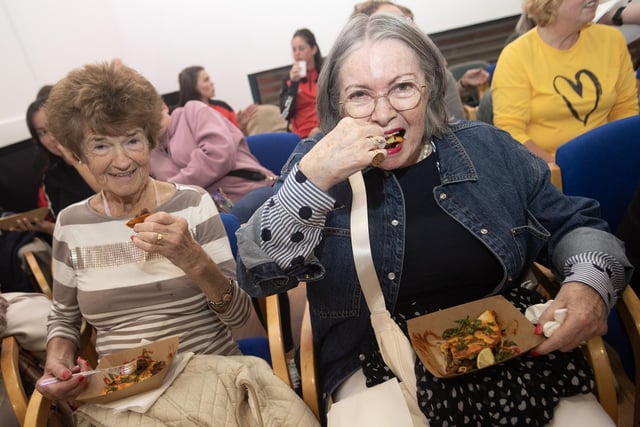 Loving the food are Dolores O'Donnell and Mary McCauley on Wednesday night in Creggan.