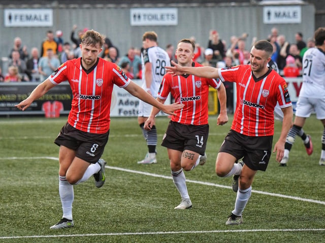 Will Patching wheels away to celebrates his stoppage time winner with the Derry fans in the Southend Park stand
