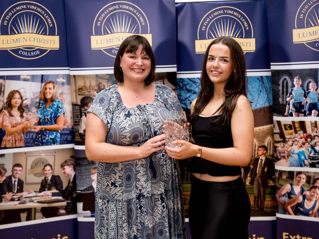 The DuPont Award for Chemistry is presented to Rosie Maguire by Mrs Lynsey Campbell, (Head of Chemistry). Lumen Christi College